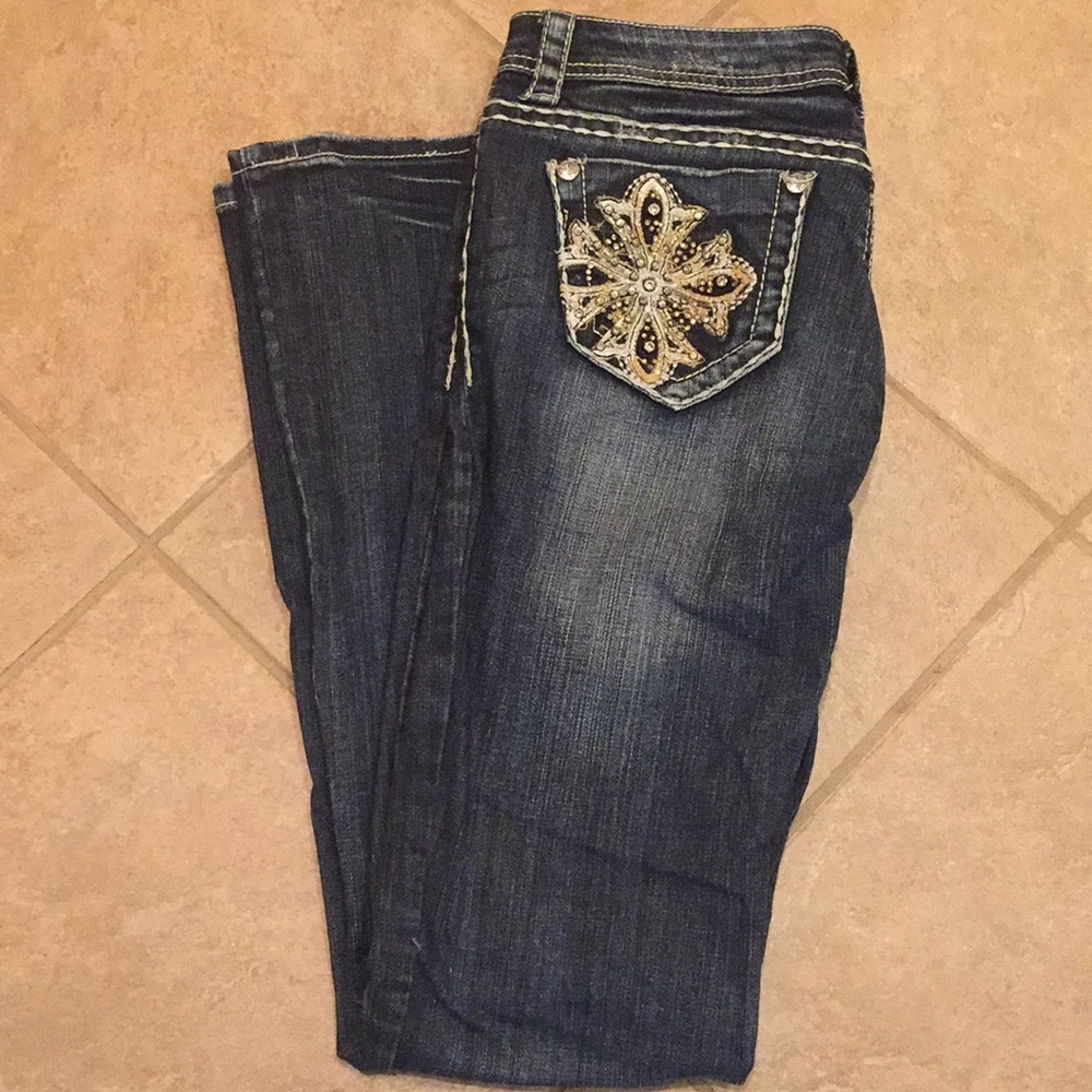 Grace in L.A. distressed boot cut jeans. Size 27